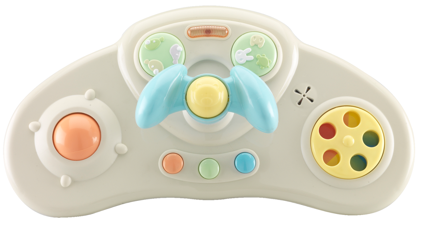 Toy steering wheel with colorful buttons on a white background