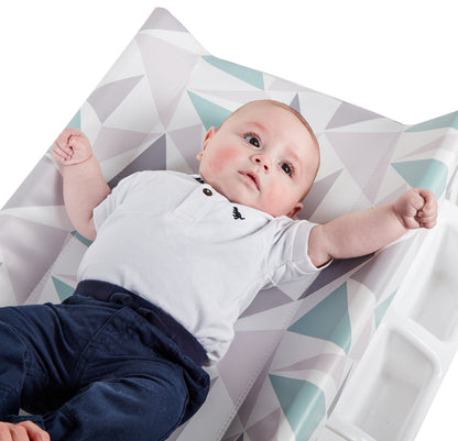Baby lying on a geometric-patterned mat