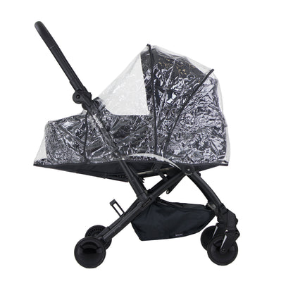 Black stroller with a transparent rain cover on a white background