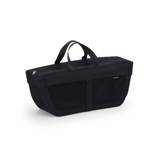 Black duffel bag with handles on a white background
