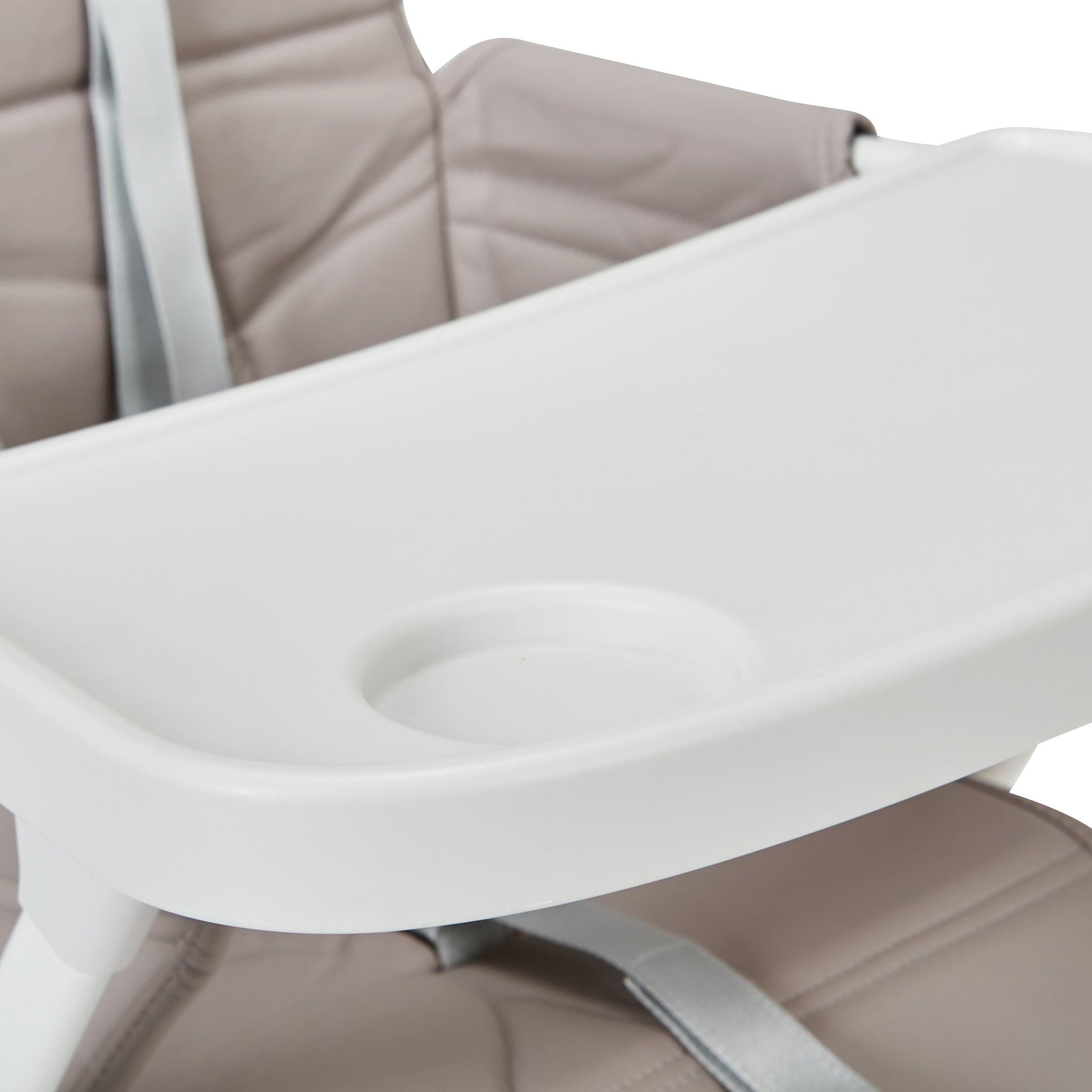 Hideaway highchair tray with cup holder