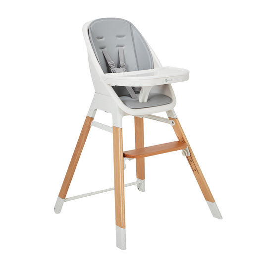 Lars 3-in-1 highchair with grey seat pad, white tray and wooden legs, front three-quarter view