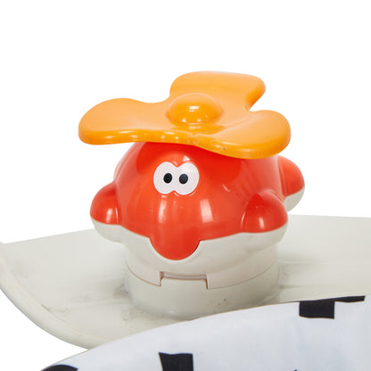 Red and orange toy with a face on a white background