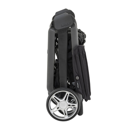 stroller folded upright, side view (compact fold)