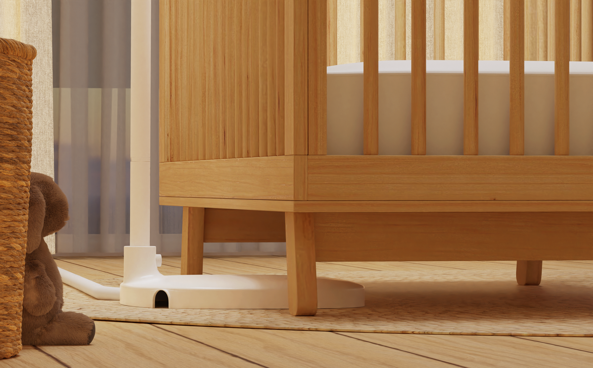 Nanit floor stand base near cot in nursery